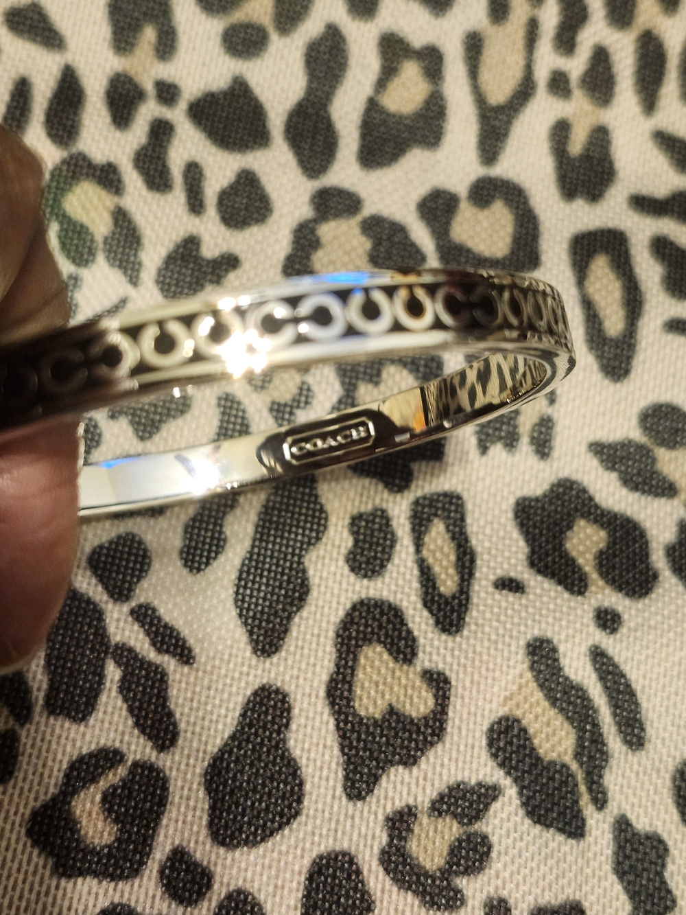 Coach Silver Signature Cutout Bangle Bracelet